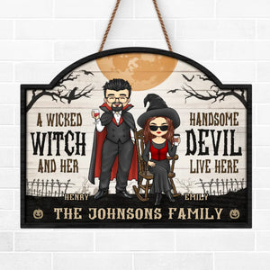 A Wicked Witch And Her Handsome Devil Live Here - Couple Personalized Custom Home Decor Wood Sign - Halloween Gift For Husband Wife, Anniversary