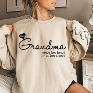 Grand-mère porte son cœur sur sa manche - Sweat-shirt unisexe personnalisé avec motif sur la manche - Cadeau de Noël pour maman et grand-mère